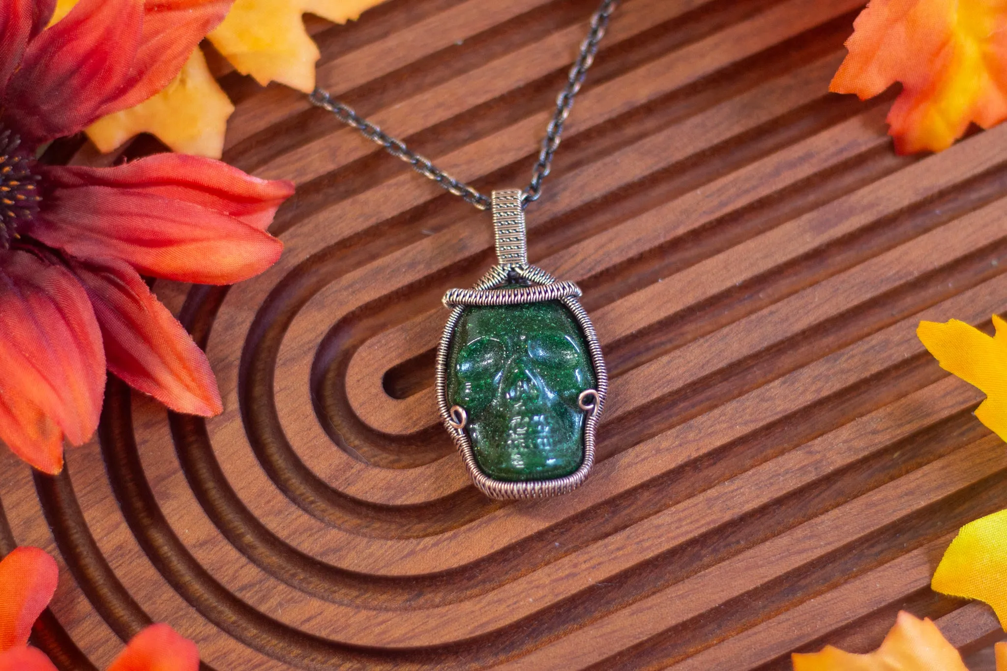 Dark Glittery Green Skull with Copper Wire Wrapping