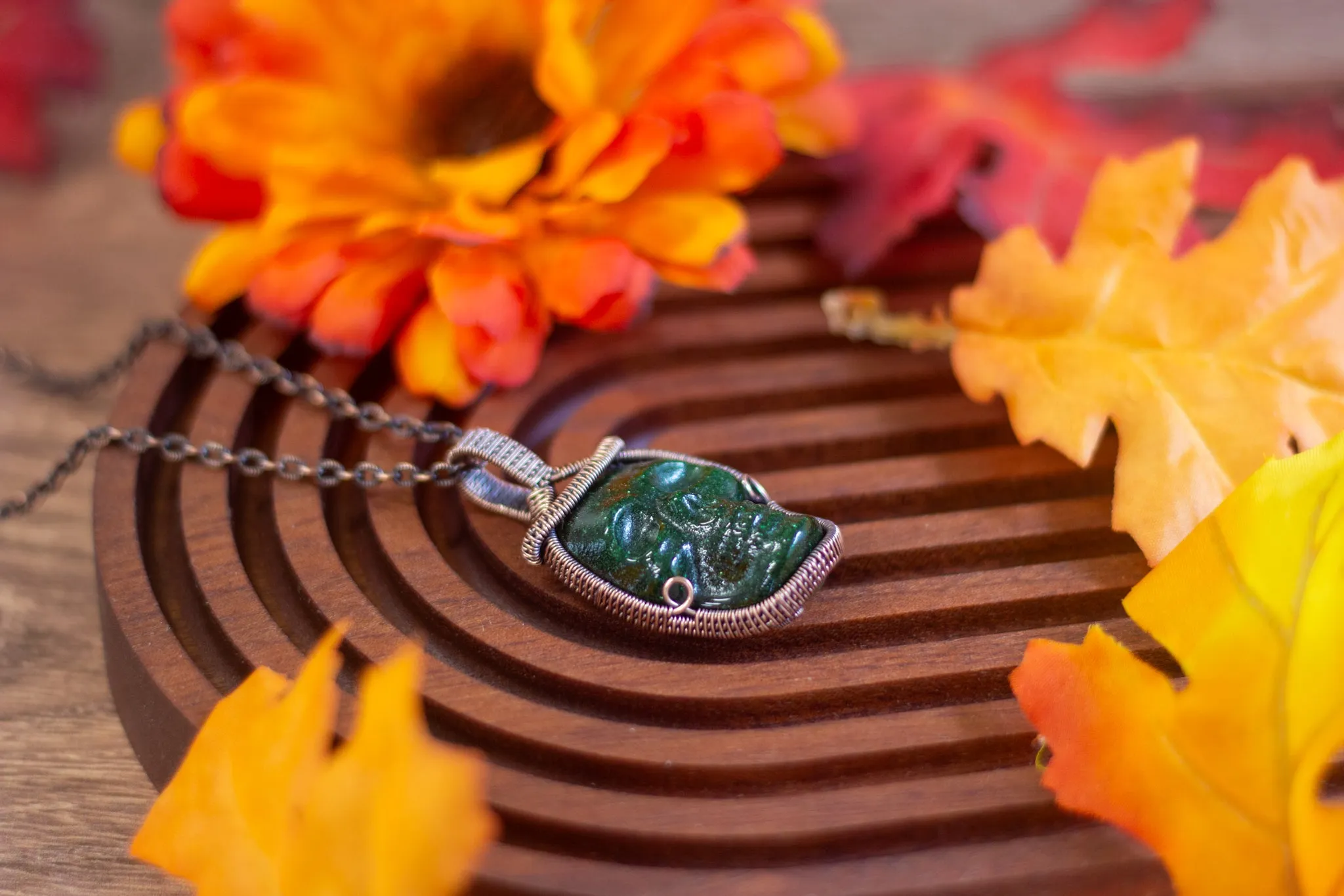 Dark Glittery Green Skull with Copper Wire Wrapping